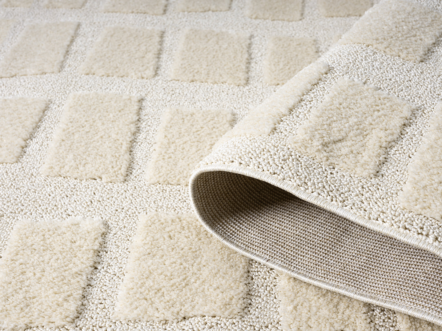 Isabella Living Room Area Rugs - Embossed Cobble Design