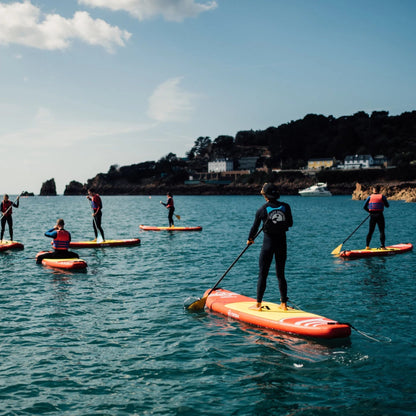 Get Out On The Sea and Feel The Sunshine With A Stand Up Paddle Board Lesson in St. Brelade’s Bay with Absolute Adventures - Only £20 Per Person!