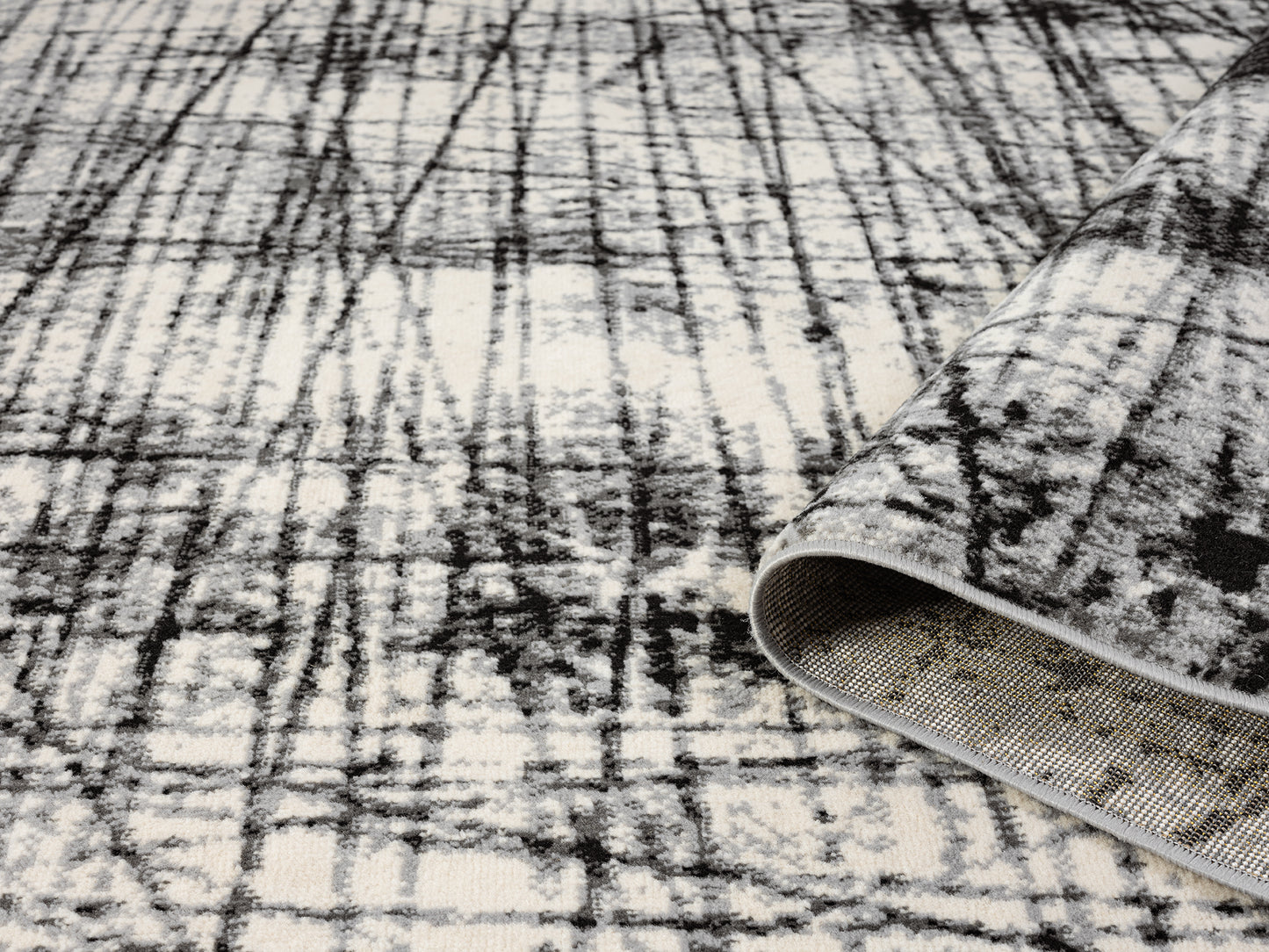 Obsidian Modern Low Pile Area Rug - Oblique Abstract Design
