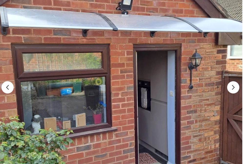 Curved Polycarbonate Door Canopy with Aluminium Frame  - Black & Clear