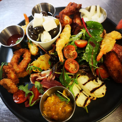 Hola Amigos! Tapas By The Sea! Treat yourself to 6 delicious Tapas dishes for just £32 at The Dockyard Restaurant at The Marina Metro, Havre des Pas! Perfect for sharing!