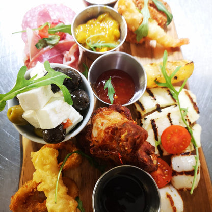 Hola Amigos! Tapas By The Sea! Treat yourself to 6 delicious Tapas dishes for just £32 at The Dockyard Restaurant at The Marina Metro, Havre des Pas! Perfect for sharing!